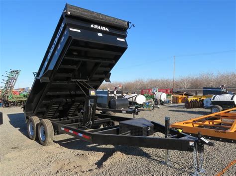 Sold By Premier Equipment, LLC. . Farm dump trailer 7014r